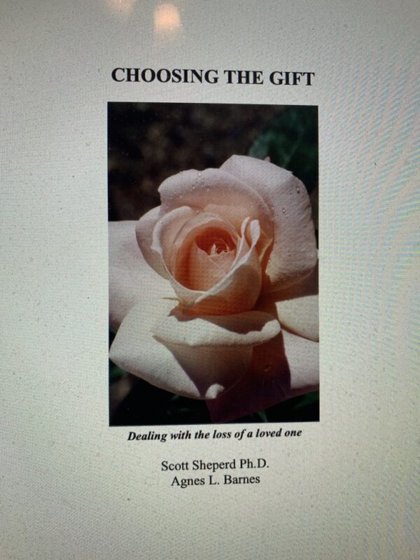 An image of a rose with the words choosing the gift on the screen